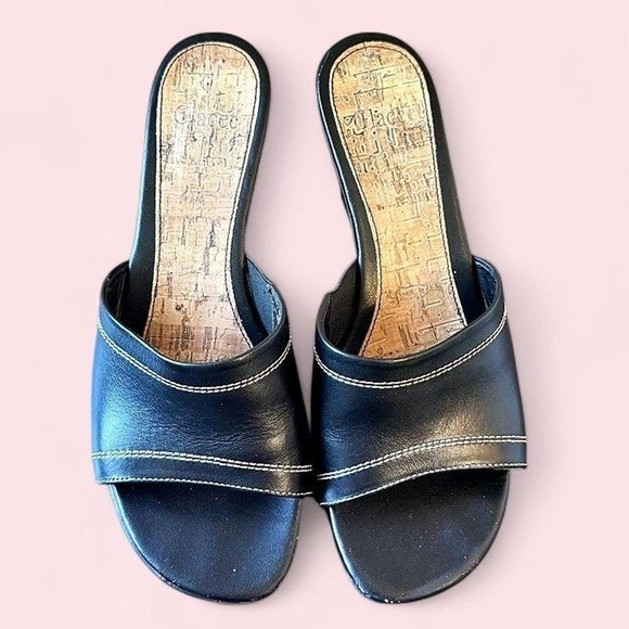 Classic black leather wedge sandals with contrast white stitching 🖤